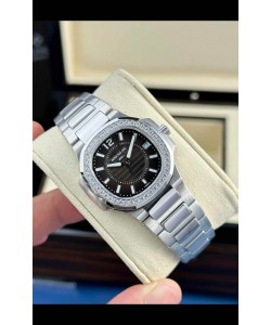 Patek Philippe Nautilus Super Clone 7010 32MM Réplique 1:1 Cadran Noir 